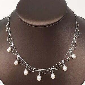 Elegant Silver and Cream Pearl Necklace